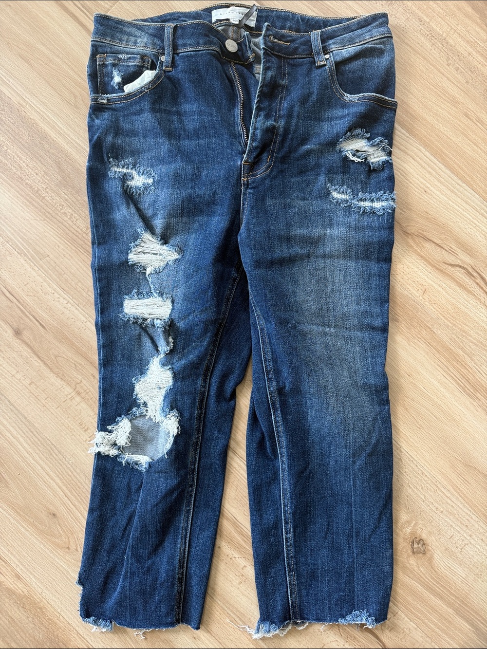Women’s Distressed Dark Blue Jeans